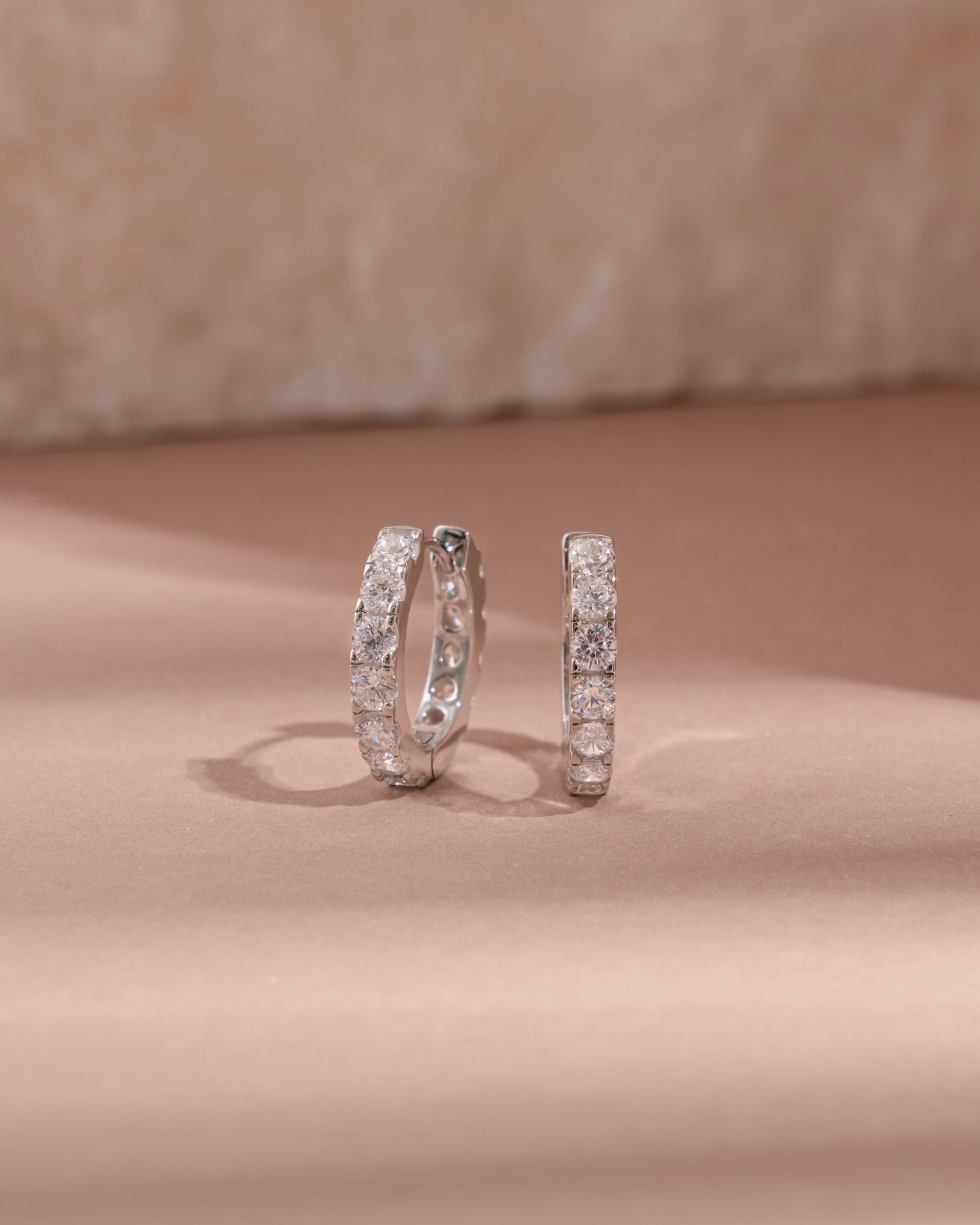 closeup image of cubic zirconia studded hoop earrings