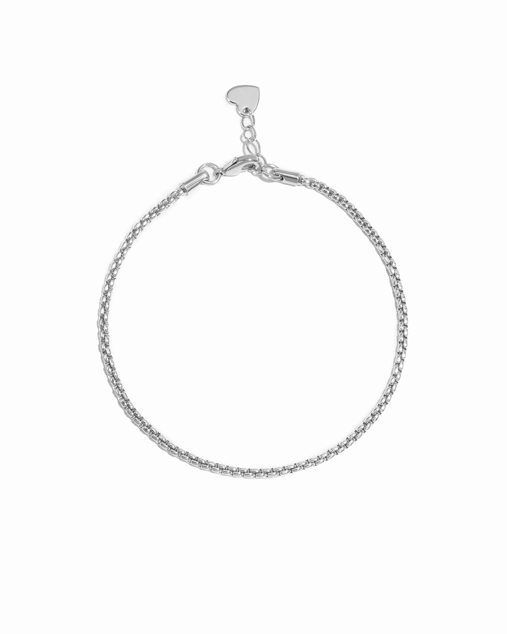 Silver box chain bracelet on white background 