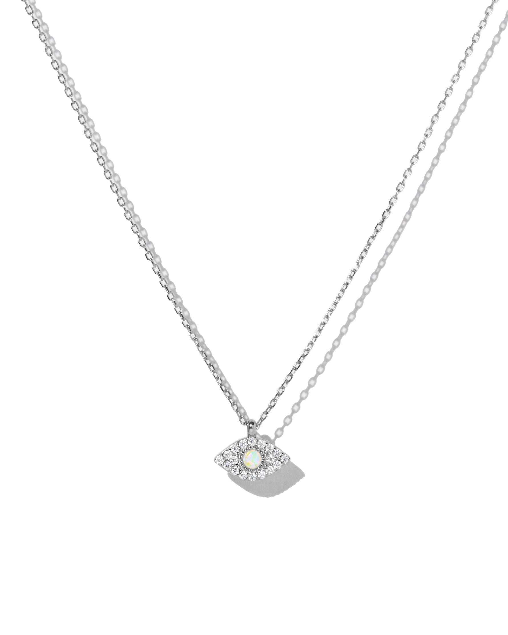 sterling silver necklace with a small opal pendant on a white background