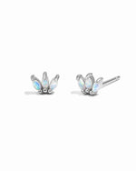 Pair of silver floral earrings with opal stones on a white background