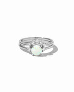 closeup image of silver opal ring set