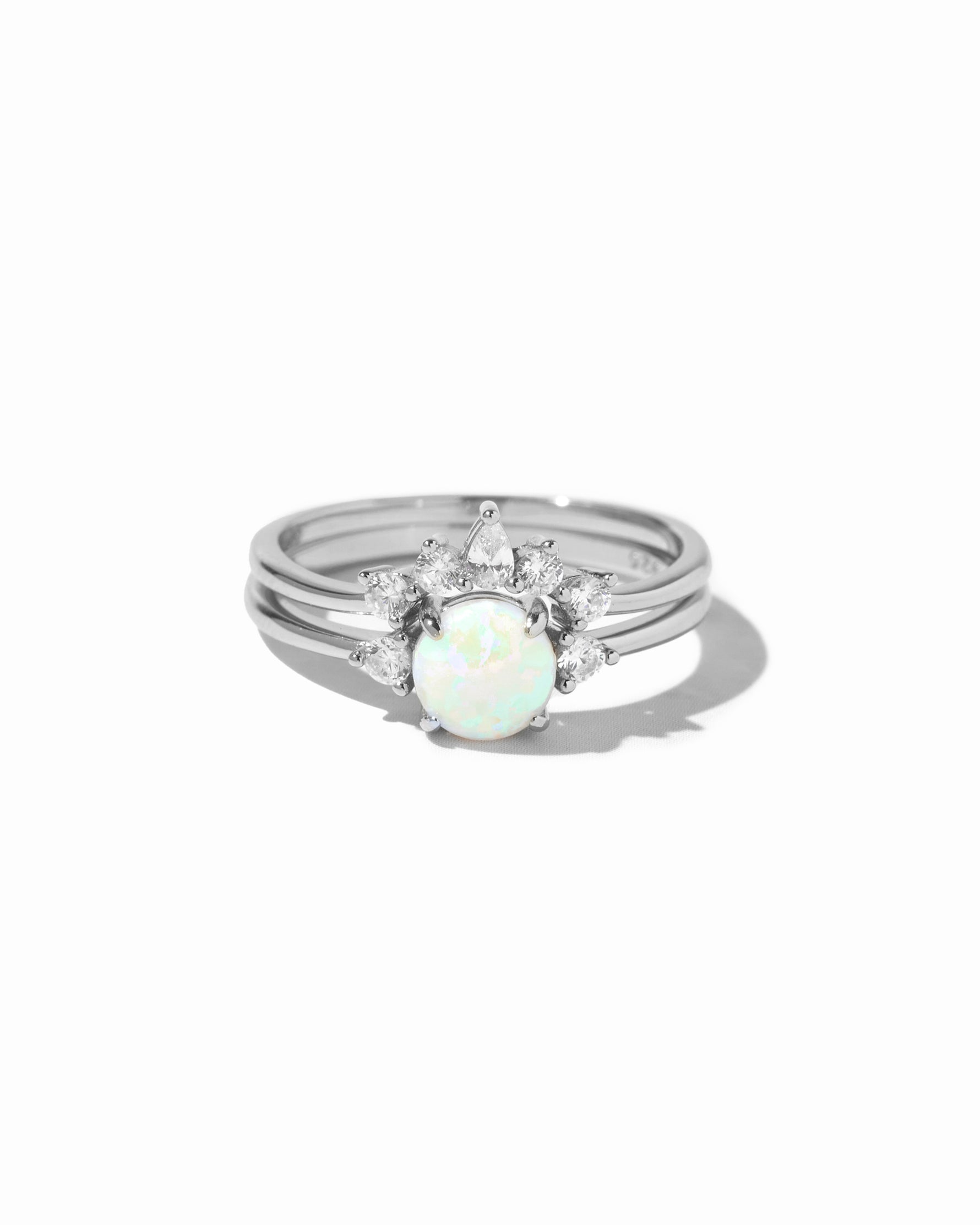 closeup image of silver opal ring set