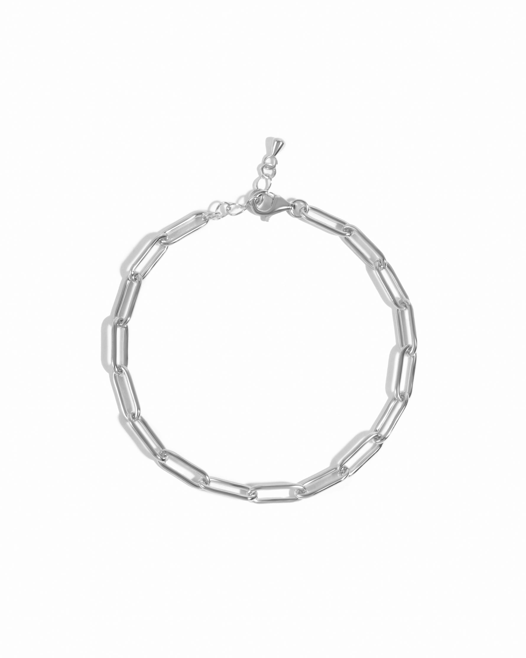 Silver chain bracelet on a white background
