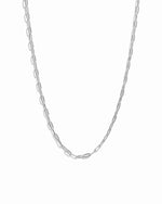 Silver chain necklace on a white background
