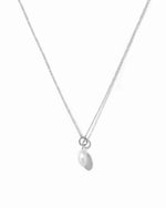 Pearl necklace on a white background