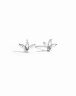 closeup image of silver petal stud earrings