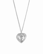 Silver statement necklace on a white background