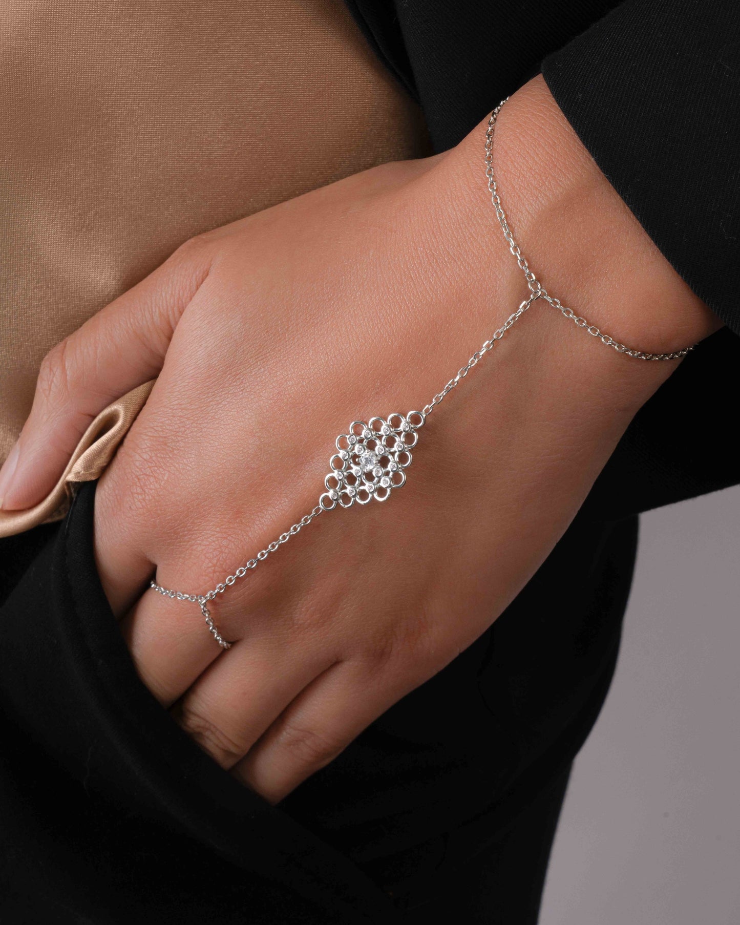 model wearing sterling silver adjustable hand bracelet