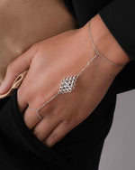 model wearing sterling silver adjustable hand bracelet