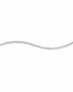 silver chain link stacking bracelet on white background