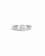 dome ring featuring silver baguette stone