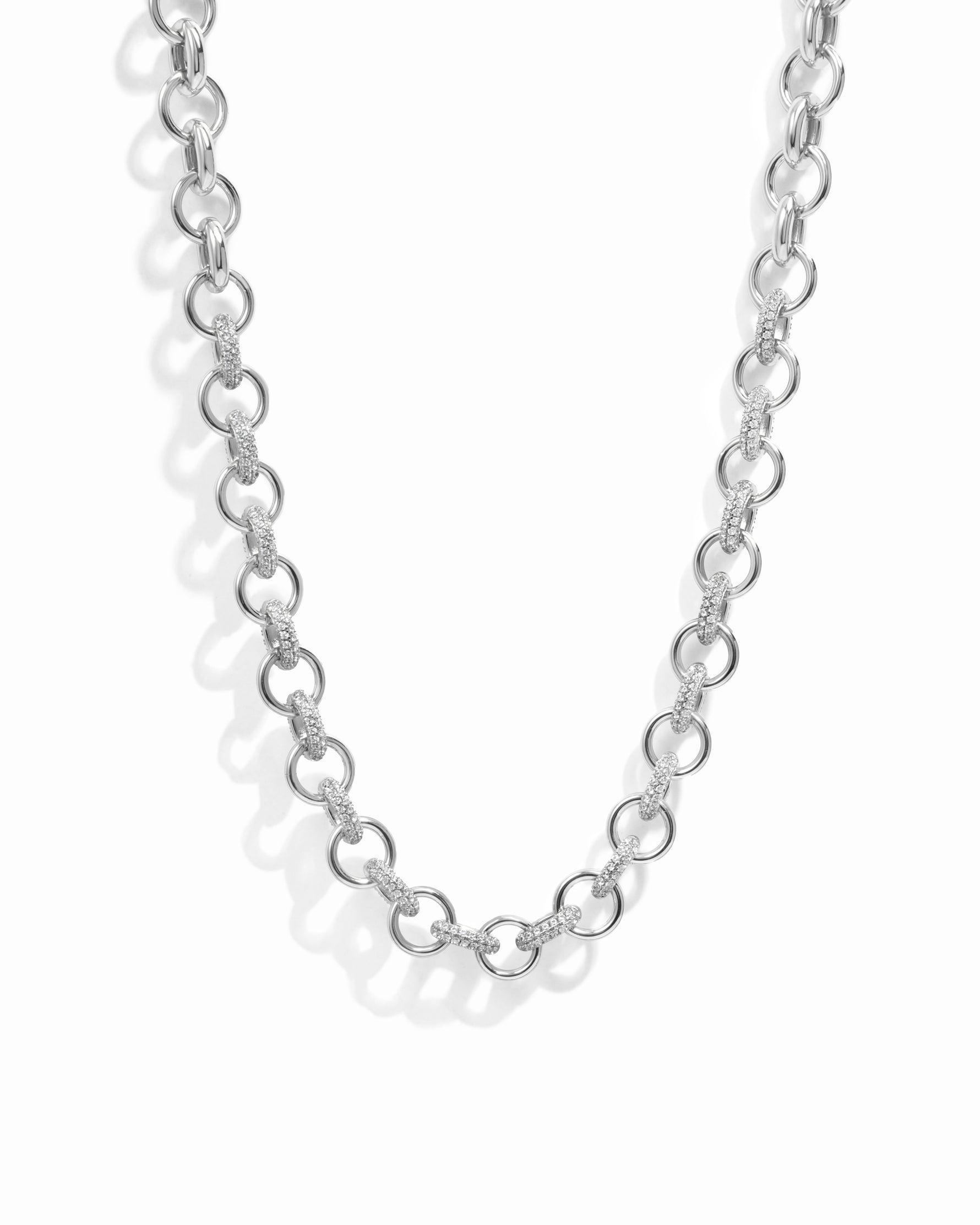 Closeup image of silver chain unique necklace
