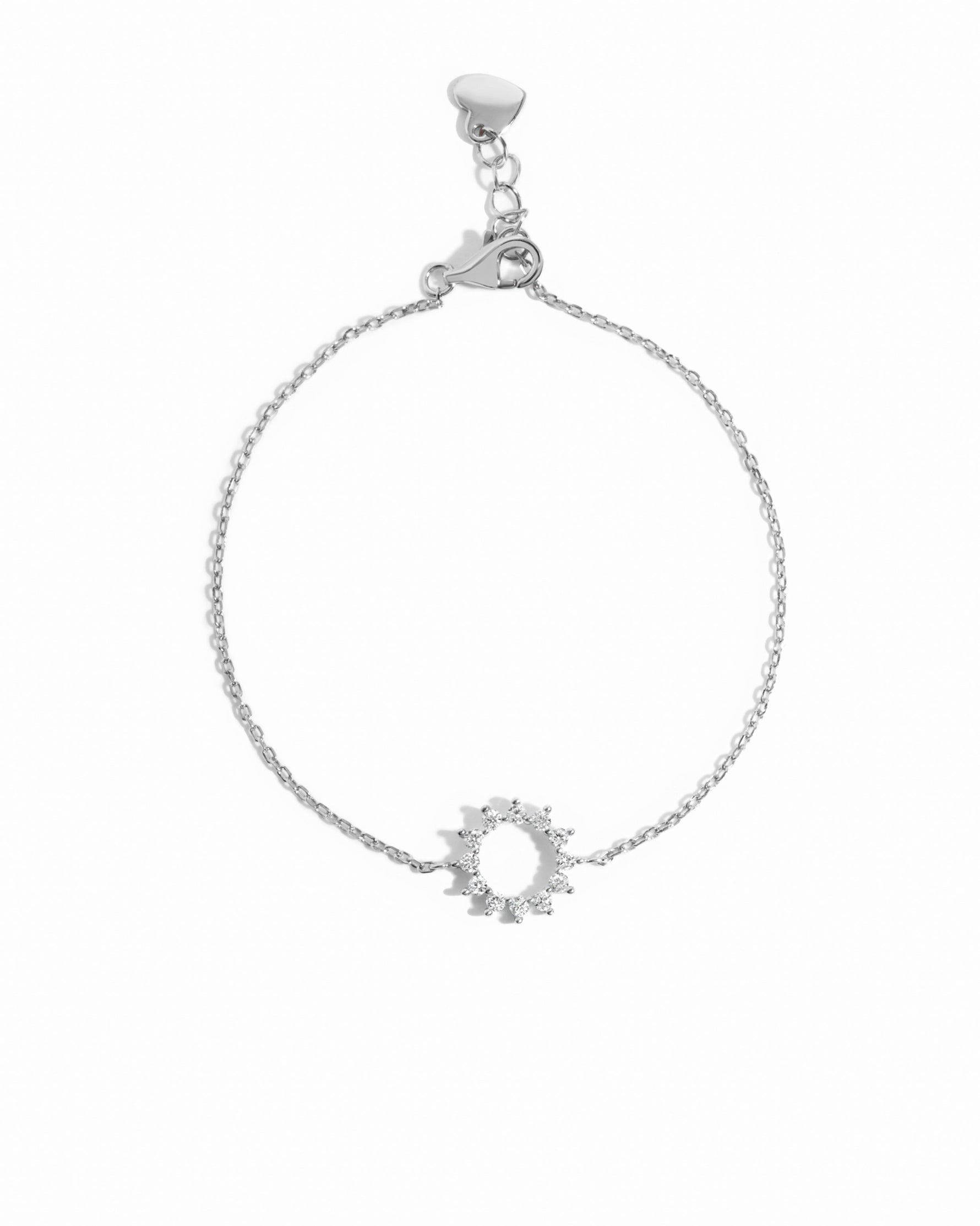 silver stacking chain bracelet with diamond charm on white background