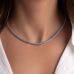 closeup image of turquoise layer necklace with tennis chain design