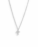 small pendant necklace with tiny cross pendant in sterling silver