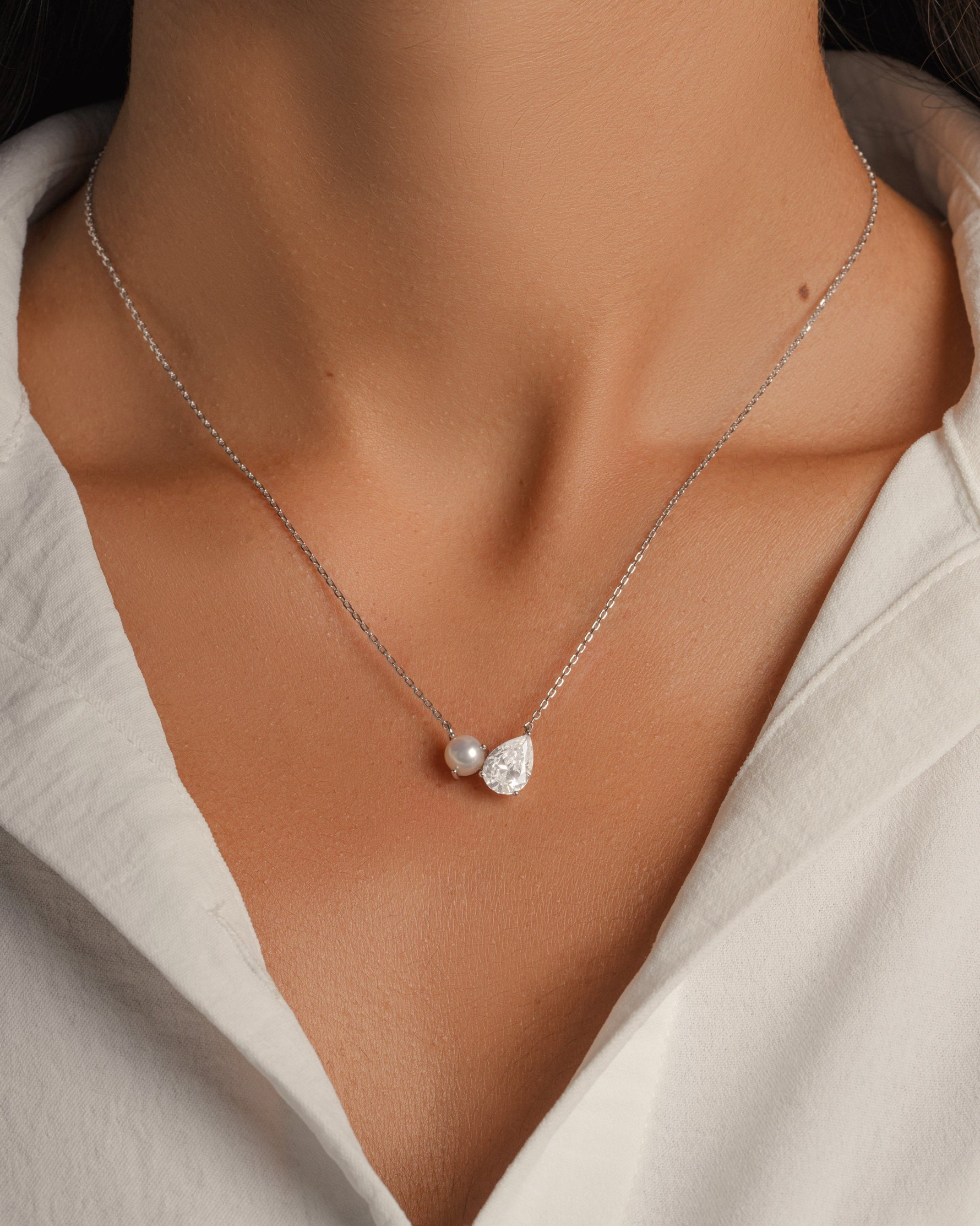 Sterling silver layering necklace on model