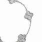 closeup image of intricate clover design on silver chain bracelet