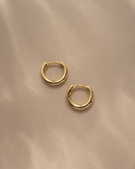 dainty hoop earring in gold