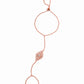 closeup image of rose gold hand chain bracelet