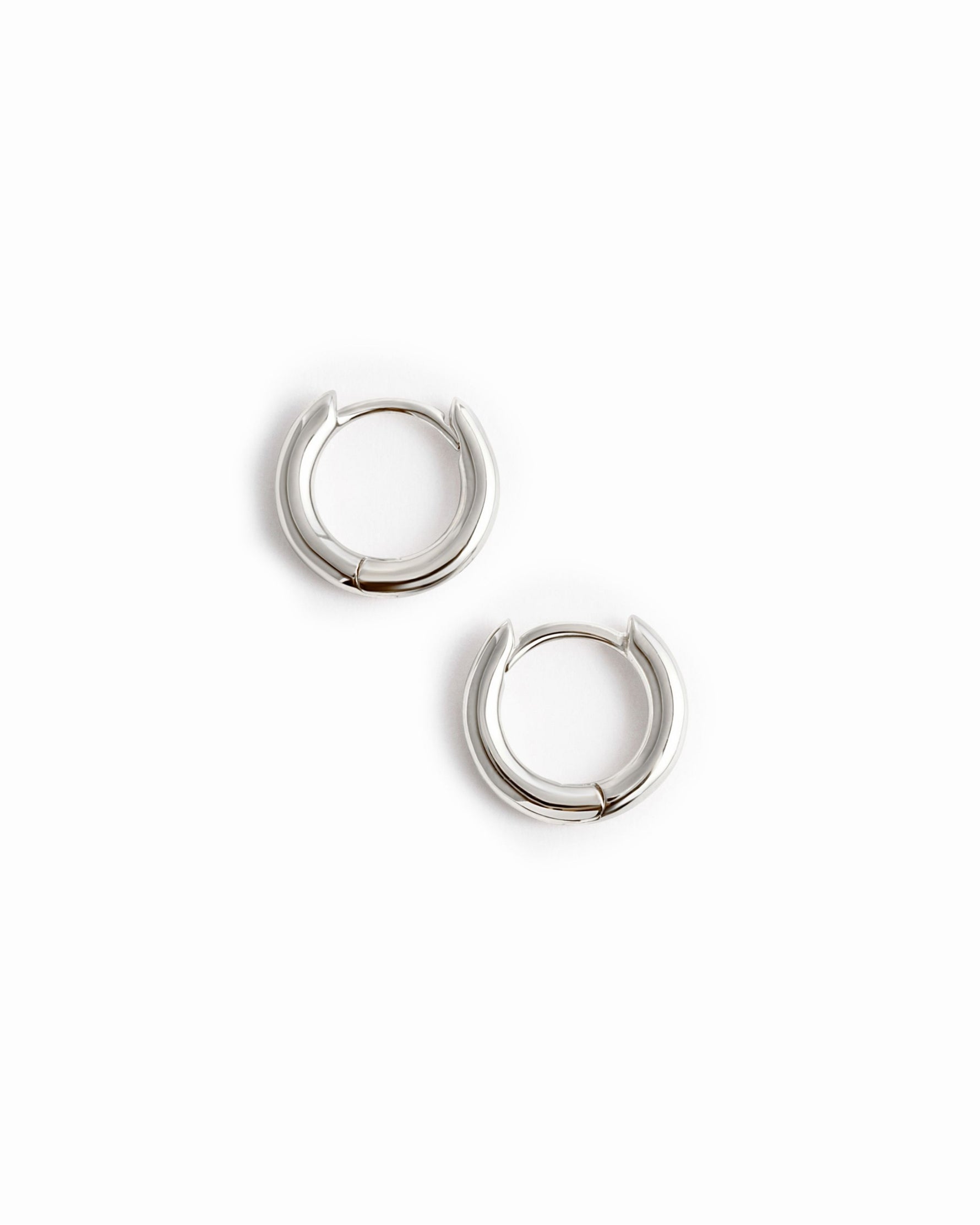 closeup image of small mini huggie in sterling silver 