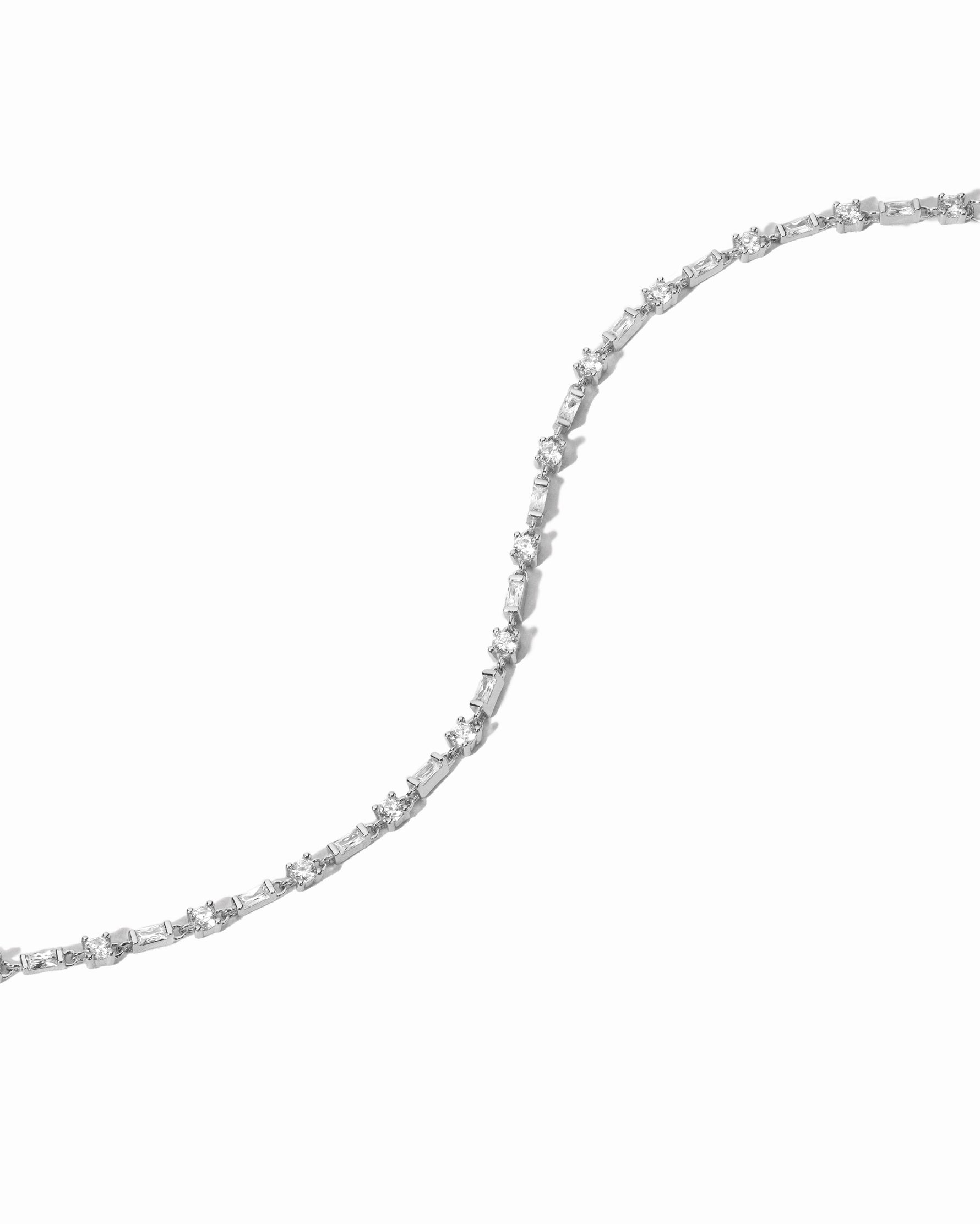 silver baguette & solitaire diamond bracelet