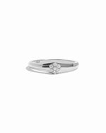 Silver ring with a cz diamond on a white background