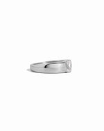 closeup image of silver dome ring