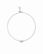 Silver anklet with a delicate butterfly pendant on a white background