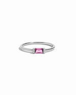 Sterling ring with a pink gemstone on a white background