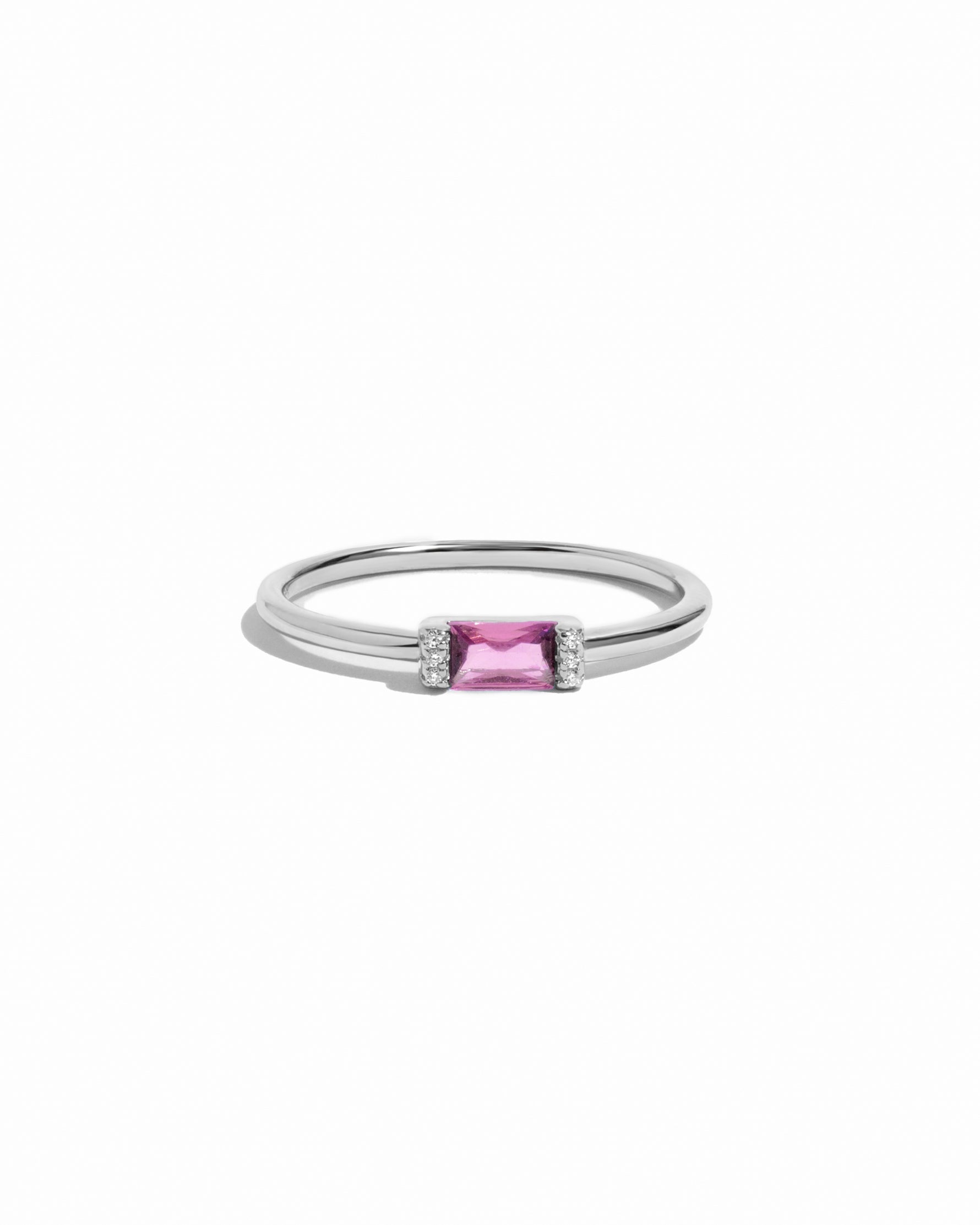Sterling ring with a pink gemstone on a white background