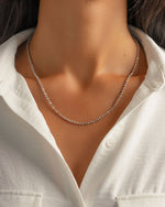 Model wearing sterling silver minimalist necklace 