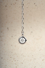 Sterling silver dainty necklace with a silver chain and diamond pendant 