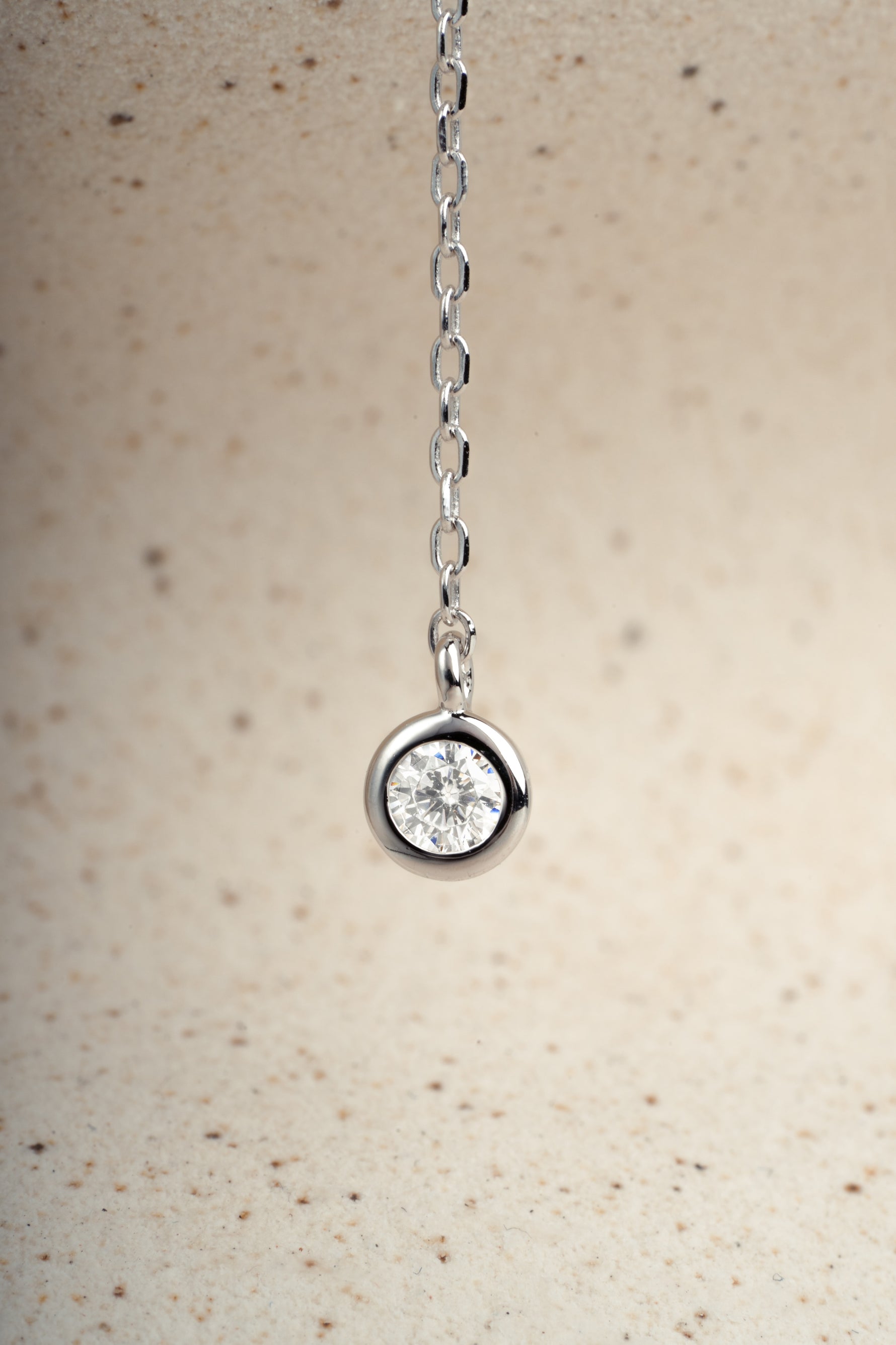 Sterling silver dainty necklace with a silver chain and diamond pendant 