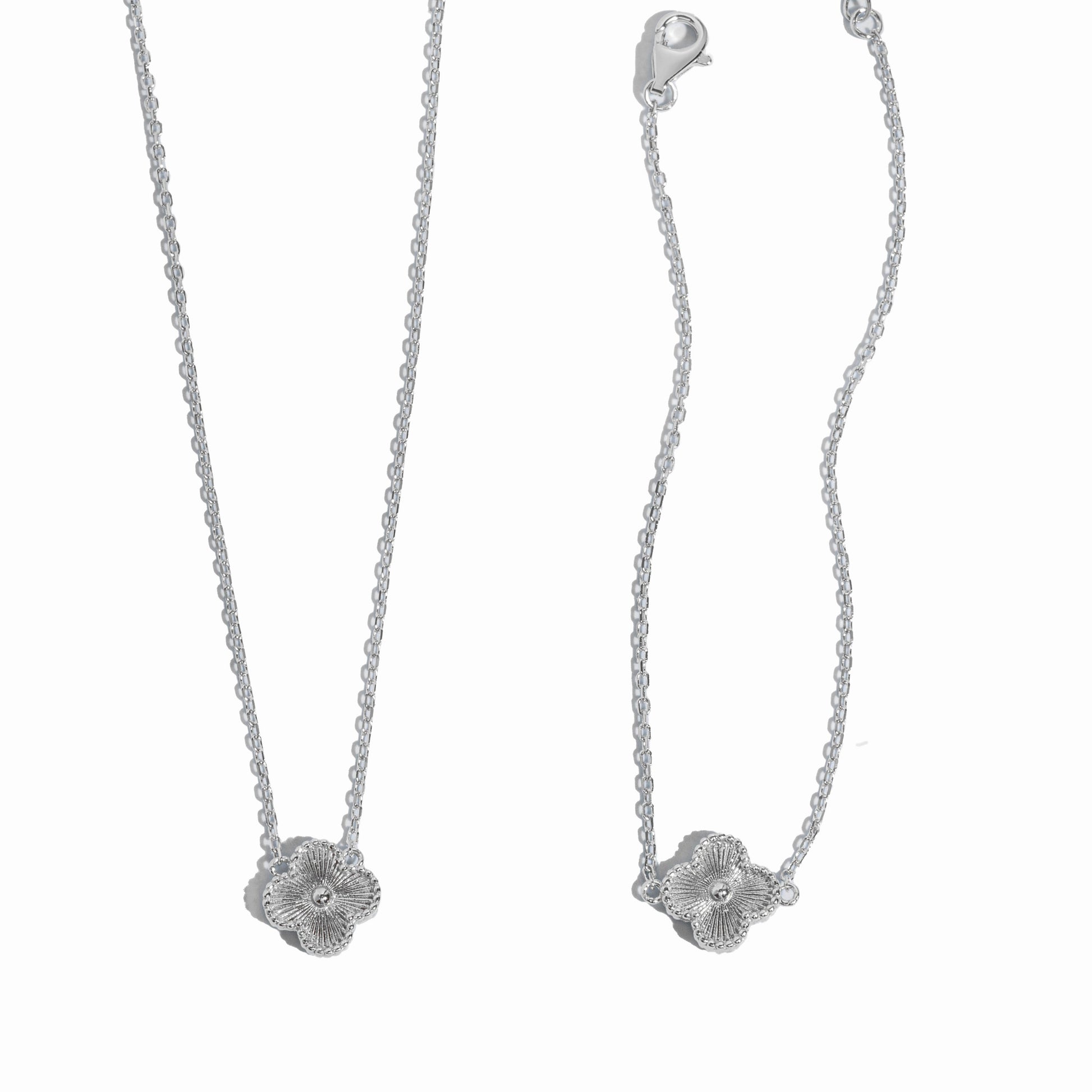 silver four leaf clover pendant necklace and matching pendant bracelet