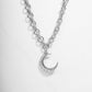silver pendant necklace with crescent moon charm