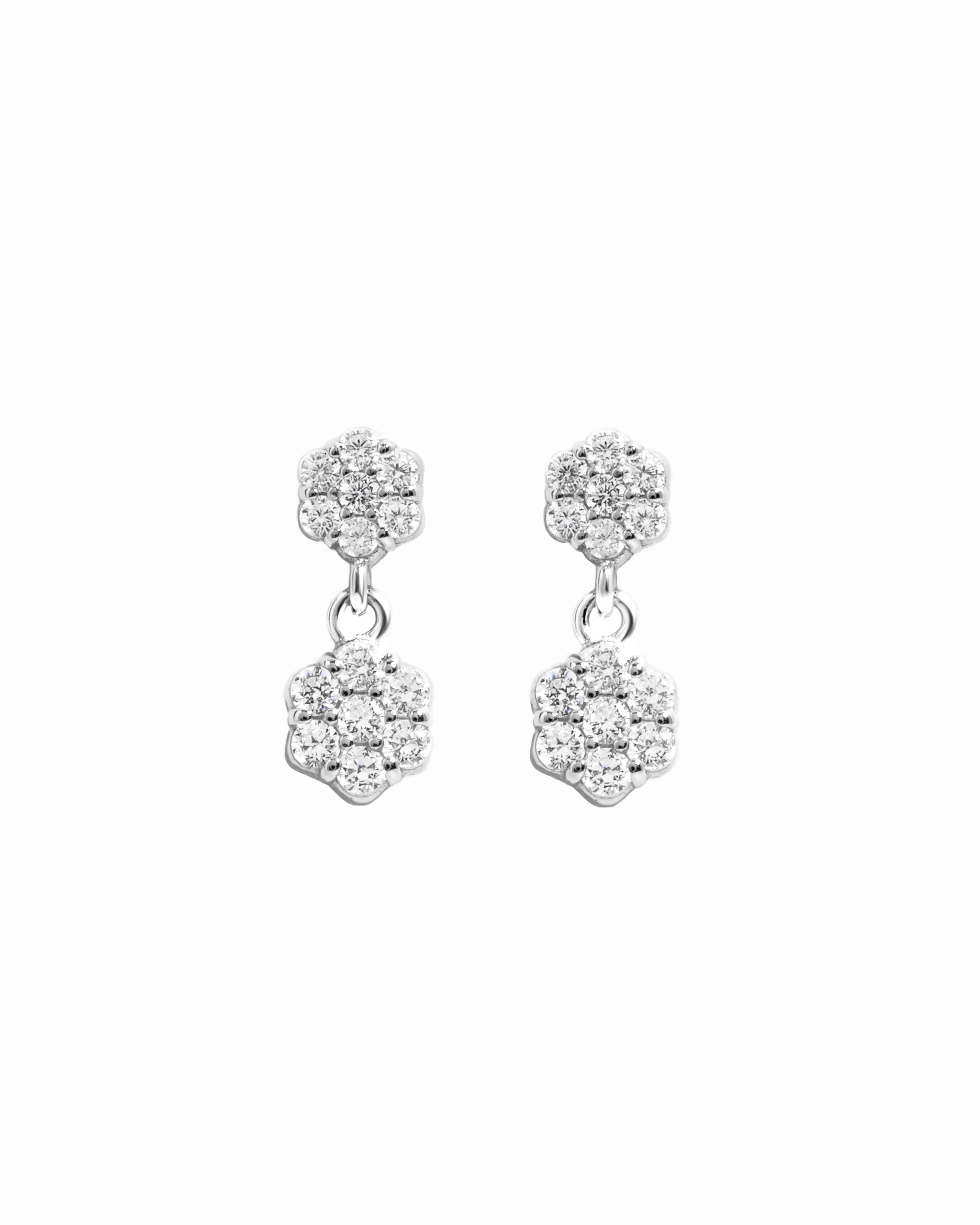Sterling silver floral earrings on a white background