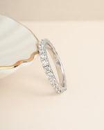 Sterling silver wedding jewelry featuring a diamond stacking ring 