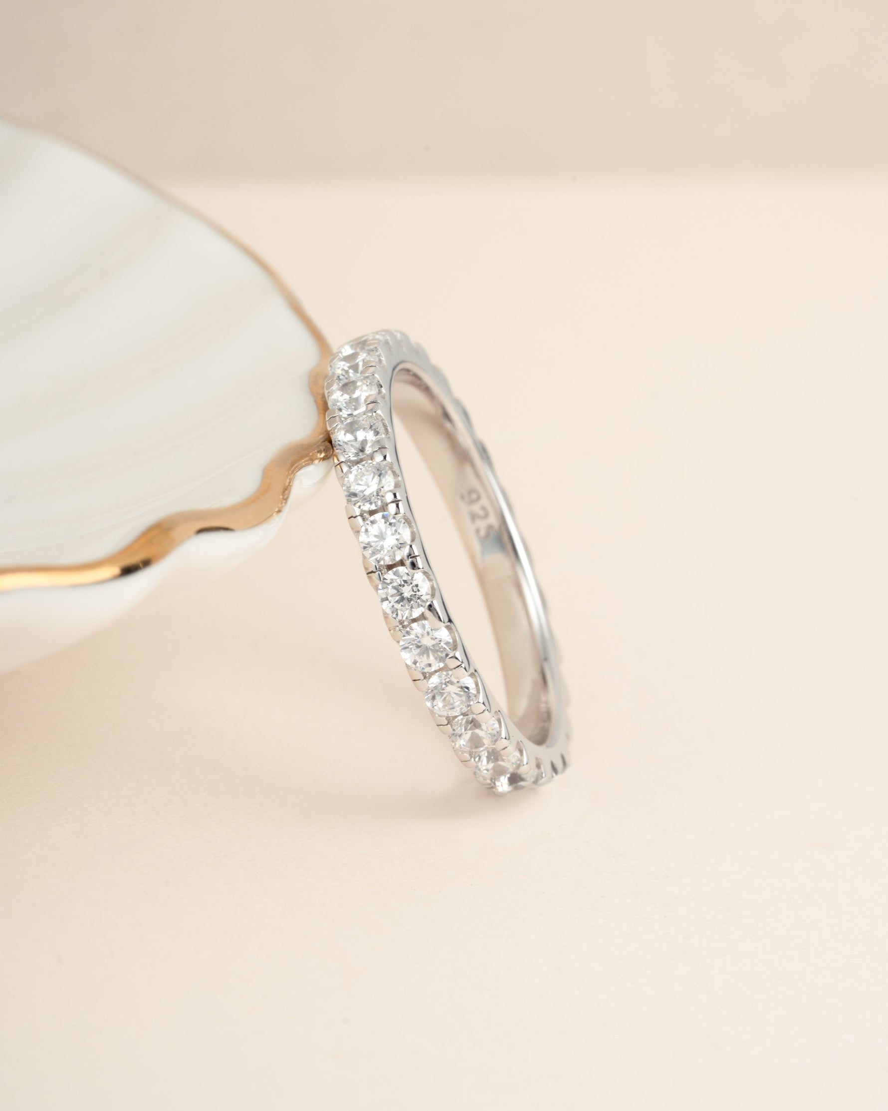 Sterling silver wedding jewelry featuring a diamond stacking ring 