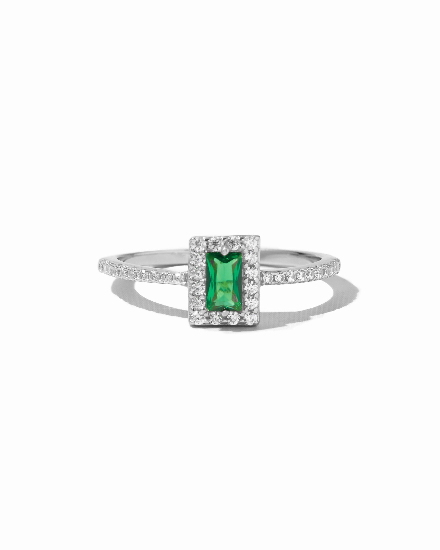 emerald cut halo ring in sterling silver with an emerald birthstone 