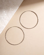 Single large silver hoop earring with diamond detail—perfect statement piece and minimalist everyday earring.