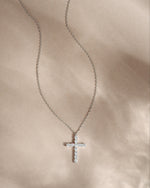 Sterling silver chain necklace with a dainty cross pendant