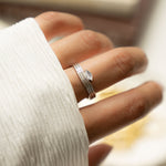 model wearing silver marquise cut dainty ring