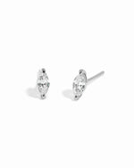 Sterling silver diamond earrings on a white background
