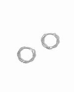 Sterling silver twisted hoop earrings on white background