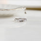 closeup image of silver stackable marquise ring