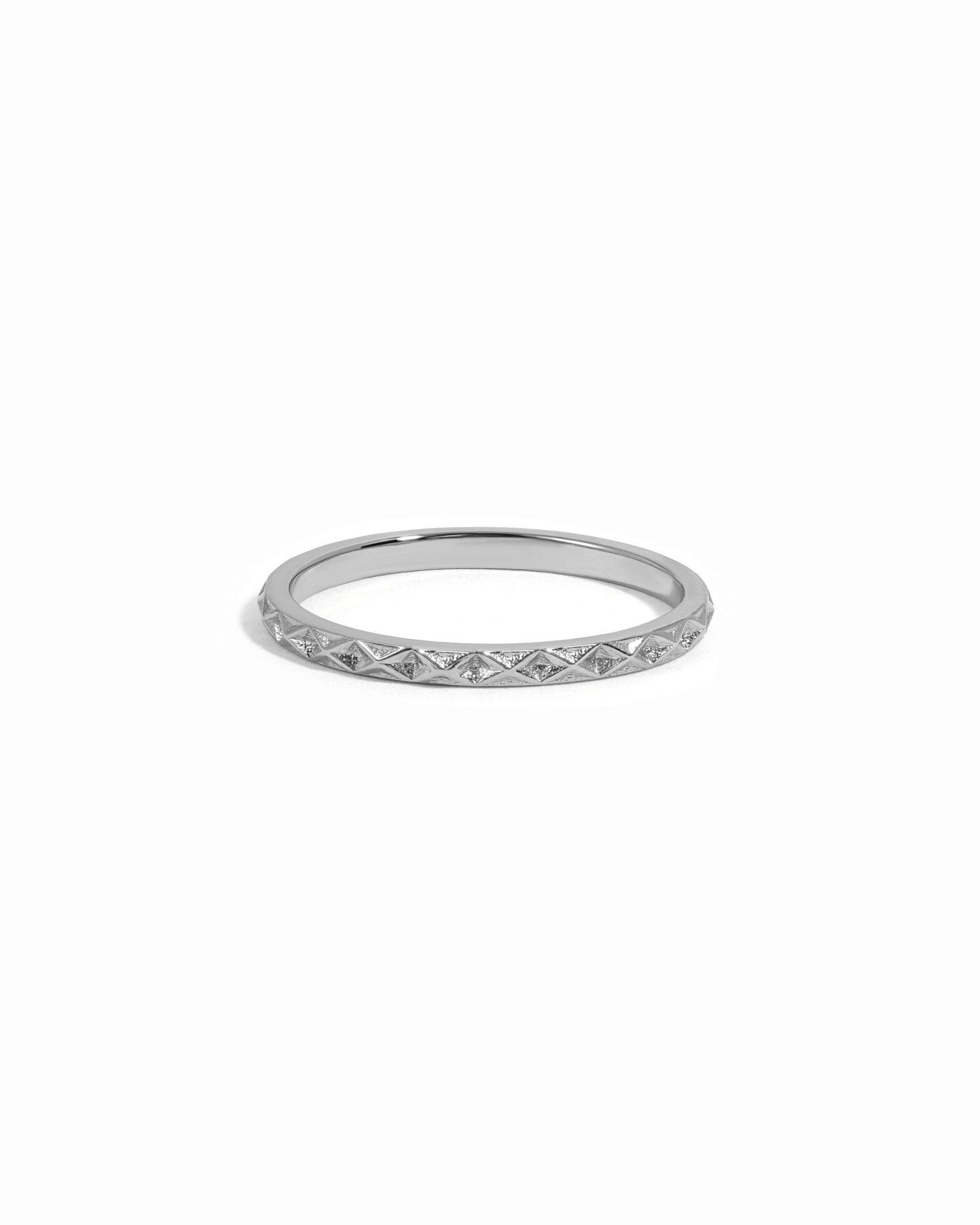 Sterling silver dainty ring on white background