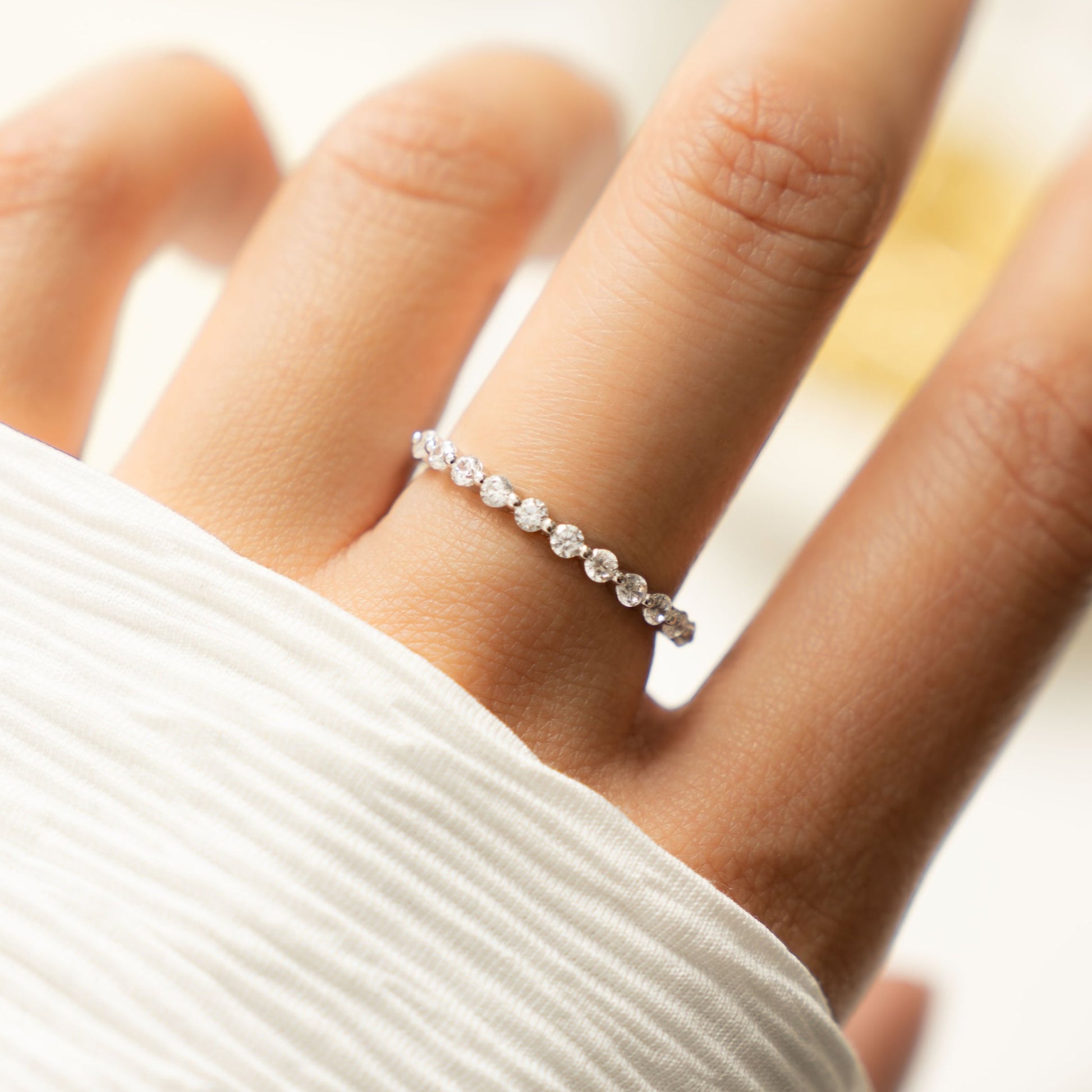 model wearing silver stackable ring