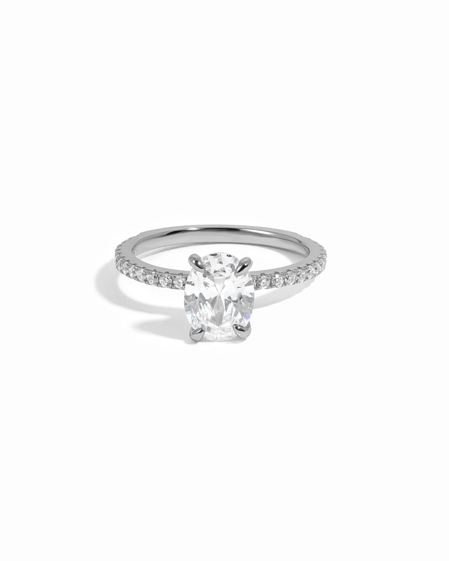 Sterling silver promise ring on a white background