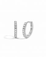 Sterling silver pavé huggie hoops.