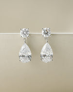 Sterling silver minimalist earrings featuring diamond dangling earrings